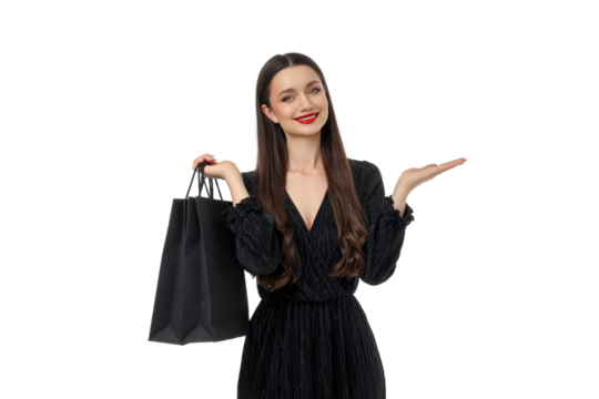 Cheerful woman with shopping bags on Black Friday, isolated, PNG