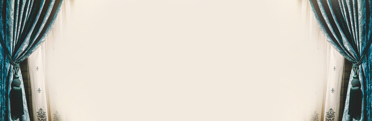 Blue and white curtains against the wall
