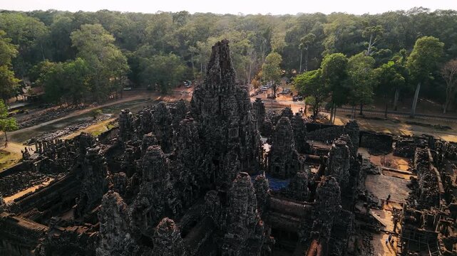 Aerial view of the bayon temple in angkor thom, a stunning example of khmer architecture. The ancient stone monument stands amidst a lush jungle. UNESCO World Heritage Site