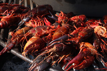 Fried crayfish in a cast-iron skillet over the fire