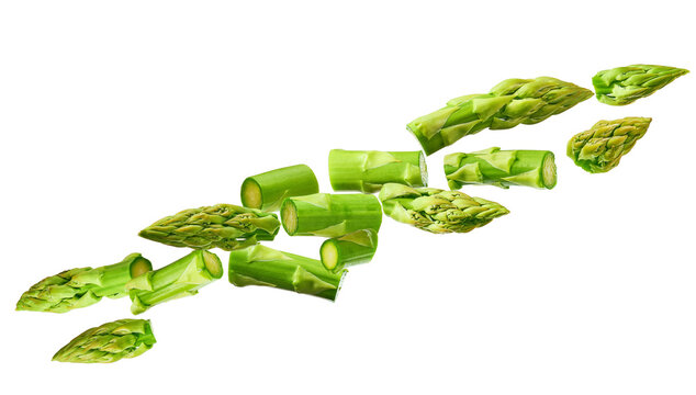 dynamic photograph of diagonally sliced green asparagus segments and tips arranged in a loose, floating composition, isolated against a transparent background.