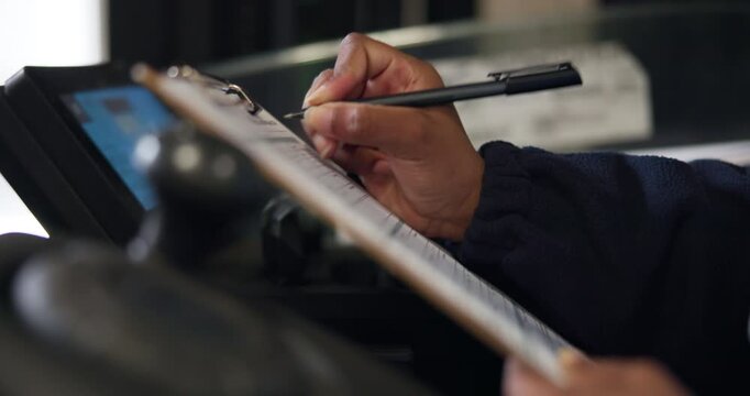 Warehouse, clipboard and hands of person on forklift for logistics, inspection and schedule. Storage depot, notes and worker on machine with paperwork for shipping, supply chain and distribution