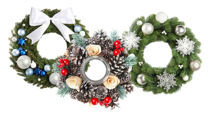 assortment photograph featuring three unique christmas holiday wreaths decorated with silver ornaments, white bows, red berries, pine cones, and snowflakes isolated on black.
