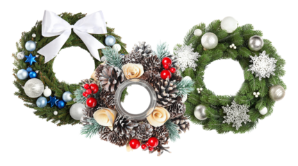 assortment photograph featuring three unique christmas holiday wreaths decorated with silver ornaments, white bows, red berries, pine cones, and snowflakes isolated on black.