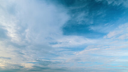 A Beautiful, Serene Sky Filled with Soft, Fluffy Clouds and a Very Vibrant Blue Horizon