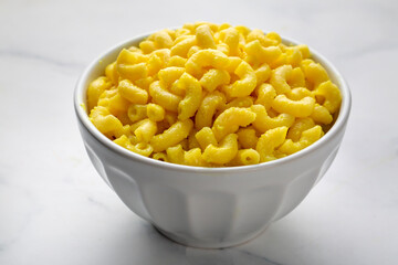 Delicious macaroni and cheese , American mac and cheese, macaroni pasta in cheesy sauce.