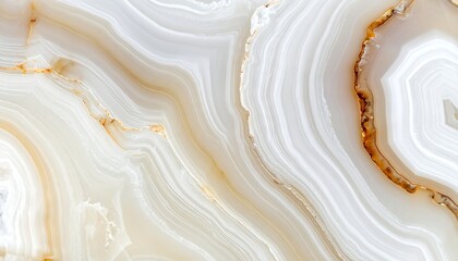 Close-up of polished, layered stone with swirling white and gold patterns