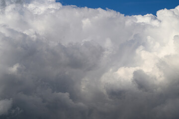 A Dramatic and Striking Cloud Formation Set Against a Bright Blue Sky Creating Visual Interest