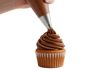 Isolated hand piping rich chocolate frosting onto a delicious vanilla cupcake creating a sweet dessert treat for celebration baking and confectionery art