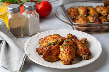 Oven-grilled chicken wings. Turkish name: Tavuk kanat