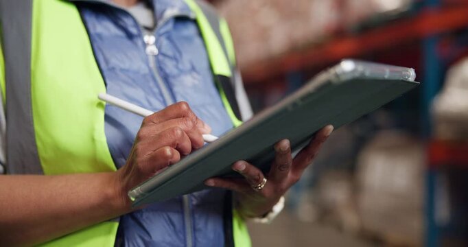 Hands, person and writing with tablet in warehouse for inventory, supply chain and schedule delivery. Worker, stylus and digital to confirm shipping, check stock and quality control for distribution