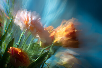flowers moving softly in the breeze with natural motion blur and a bright open space in the middle