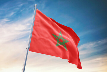 Morocco flag on sky background, waving in the wind