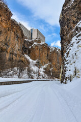 snow covered road at the bottom of Arpa river canyon in Jermuk (Vayots Dzor, Armenia)