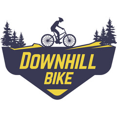 Silhouette of a mountain biker on a crest with trees and the words Downhill Bike in yellow and dark blue emblem on a transparent background symbolizing adventure and extreme sports