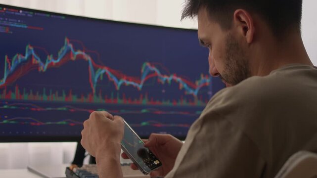 Trader observes price fluctuations closely, Hands manipulate trading charts intensely during session, Trader focuses on chart patterns and volume data to make informed choices
