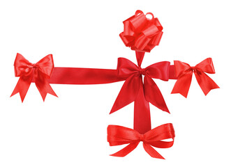 a photograph of bright red satin ribbon and bows arranged in a classic wrapping pattern, forming a cross shape, ideal for gift boxes, isolated on black.