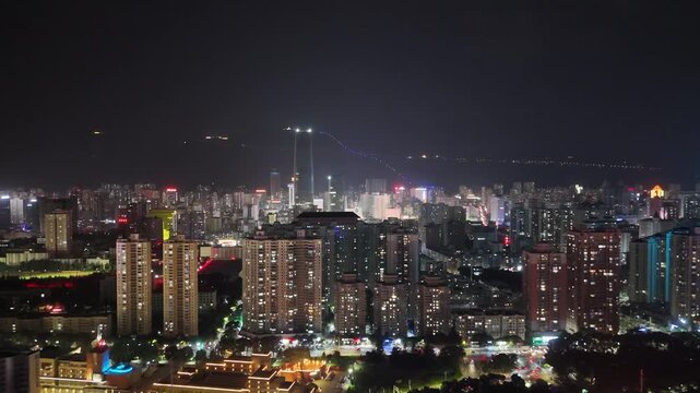 Lanzhou City Night Aerial View - Urban Skyline with Illuminated Buildings