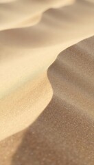 Close-up of fine, light-colored sand shifting and forming small, ephemeral dunes in a gentle breeze; evokes the feeling of quiet amusement , soft, wave, fine