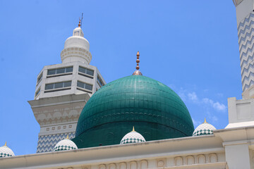Striking Green Dome and Minaret of Islamic Architecture