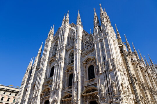 Milan Cathedral in Italy, Gothic architecture, low angle view - Powered by Adobe