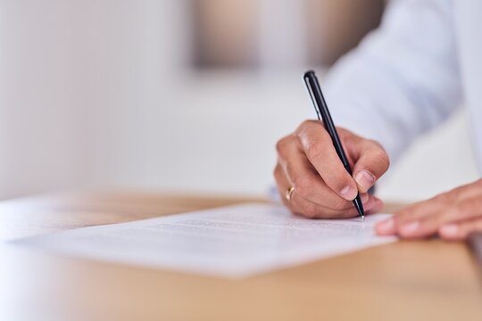 Professional Signing A Document: Close-Up Of Hand Writing On Paper With Pen - Powered by Adobe