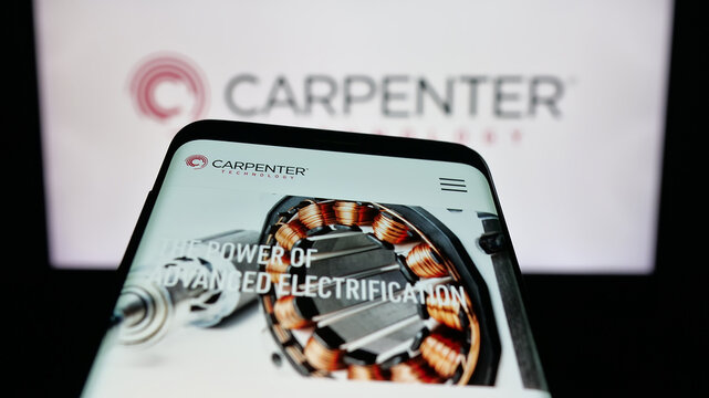 Stuttgart, Germany - 11-05-2025: Mobile phone with website of US company Carpenter Technology Corporation on screen in front of logo. Focus on top-left of phone display.