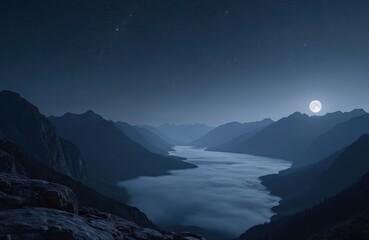 Night landscape of mountains and lake. Rocky mountain ranges under night sky with stars and full moon. View from cliff to lake at night with fog over water. Mountains silhouettes in background.