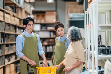 Mother and Family Business Owner Teaching About Material Production and Recycling