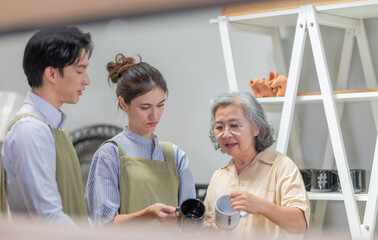 Mother and Family Business Owner Teaching About Material Production and Recycling