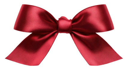 A vibrant red bow with neatly folded loops and smooth satin texture creating a festive decorative accent isolated on white background