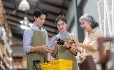 Mother and Family Business Owner Teaching About Material Production and Recycling