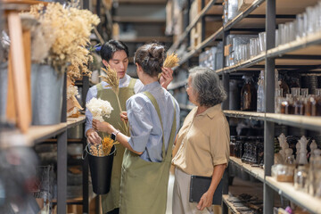 Mother and Family Business Owner Teaching About Material Production and Recycling
