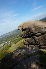 Scenic View Of Unique Weathered Gritstone Rock Formations At Black Rocks Overlooking The Historic Cromford Valley In Derbyshire, England On A Sunny Day.