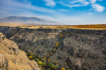 A mountain range with a river running through it