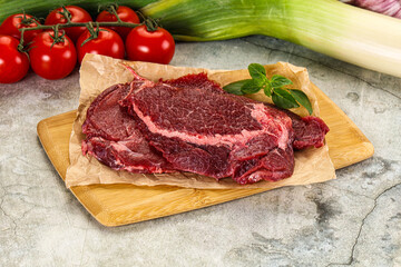 Raw beef cheeks cut for cooking