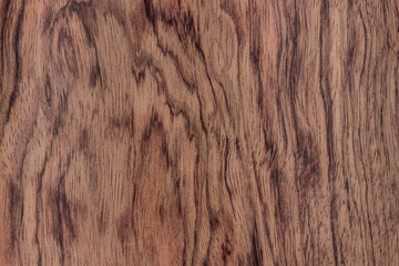 old wood. an old red board. background, wall or floor, the texture of a rustic table. bubinga, essingang, ebana, kevazingo, akume, waka, a place for a text or object. the effect of aging, horizontal