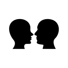 Two Facing Black Silhouette Heads on a White Background Illustrating Dialogue