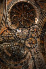 A chandelier hanging from the ceiling of a church