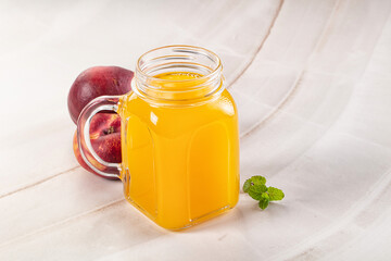 Vitamin beverage - peach juice glass