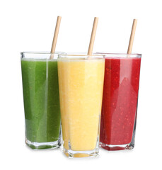 Yummy smoothies of different flavors in glasses isolated on white