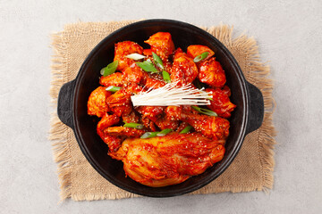 닭볶음탕은 닭고기를 토막 쳐서 양념과 물을 넣고 끓인 음식. 
Dakbokkeumtang is a dish made by boiling chicken pieces with seasoning and water.
