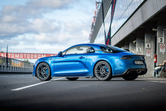 Brno, Czech Republic - October 10, 2025: Alpine A100 S light sports car made in France by the Renault concern. A small, agile car designed for racing and fast driving on the road.
