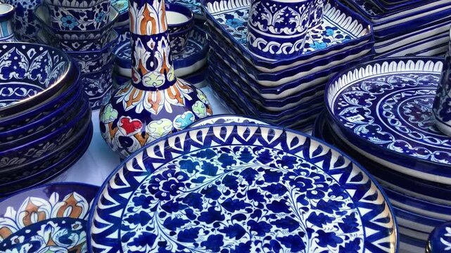 Blue Pottery on crockery a traditional art of pottery in Multan, Pakistani handicrafts work at nasarpur town Sindh, Paksiatn	