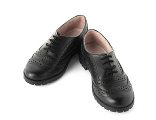 Pair of stylish kid's brogue shoes isolated on white