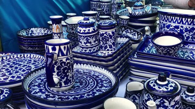 Blue Pottery on crockery a traditional art of pottery in Multan, Pakistani handicrafts work at nasarpur town Sindh, Paksiatn	