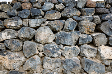 A wall made of large rocks