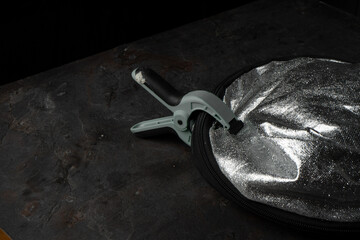 A foldable reflector for a photo shoot on a photo backdrop