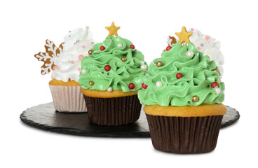 Festively decorated Christmas cupcakes isolated on white