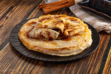 Thin homemade golden pancaces stack